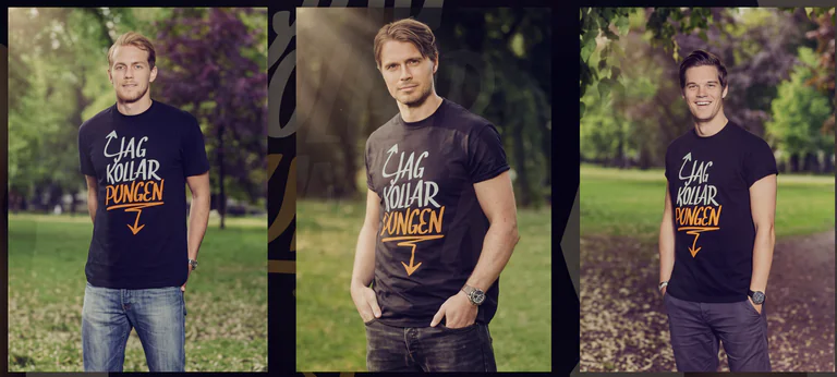 Man i en svart t-shirt med texten 'Jag kollar på ungen' och en pil nedåt, som står utomhus i en park.